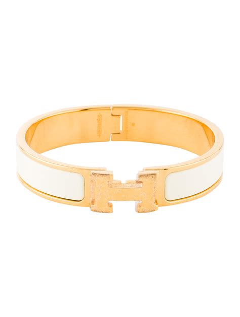 hermes gold bangle bracelet.